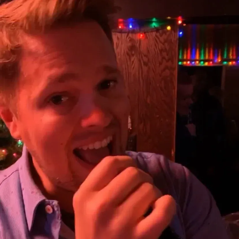 Dustin singing karaoke.